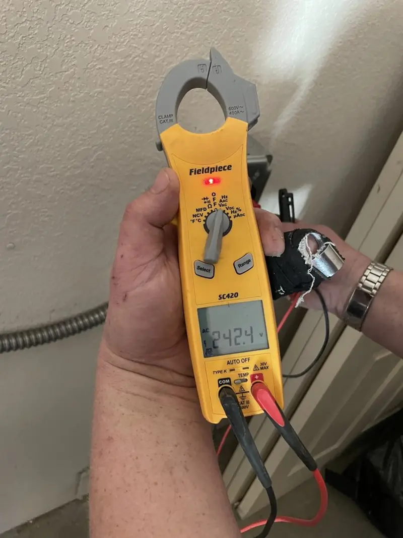 Voltage testing with clamp meter during Hot Tub / Pool Electrical Wiring in Dunn Loring